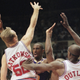 Kobe takes on three Clippers in 1997. Photo credit: Chris Pizzello/AP